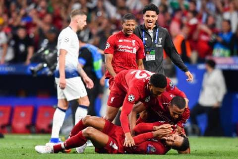 190601 Virgil van Dijk and Joe Gomez of Liverpool celebrate after winning the UEFA Champions League final between Tottenham and Liverpool on June 1, 2019 in Madrid Photo Petter Arvidson BILDBYRAN kod PA 92302,  Copyright: PETTERxARVIDSON BB190601PA158