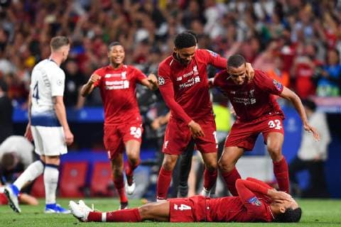 190601 Joe Gomez, Joel Matip and Virgil van Dijk of Liverpool celebrate after winning the UEFA Champions League final between Tottenham and Liverpool on June 1, 2019 in Madrid Photo Petter Arvidson BILDBYRAN kod PA 92302,  Copyright: PETTERxARVIDSON BB190601PA161
