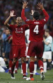 Fabinho of Liverpool celebrates with Virgil van Dijk of Liverpool during the UEFA Champions League match at Wanda Metropolitano Stadium, Madrid. Picture date: 1st June 2019. Picture credit should read: David Klein Sportimage EDITORIAL USE ONLY. No use with unauthorised audio, video, data, fixture lists, club league logos or live services. Online in-match use limited to 120 images, no video emulation. No use in betting, games or single club league player publications. SPI-0089-0053