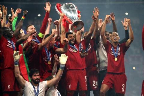 Mohamed Salah of Liverpool holds the trophy as he celebrates with team mates the victory of the Champions League Madrid 01-06-2019 Estadio Wanda Metropolitano, Football UEFA Champions League 2018 2019 Final 2019 Tottenham - Liverpool Foto Cesare Purini Insidefoto CesarexPurini