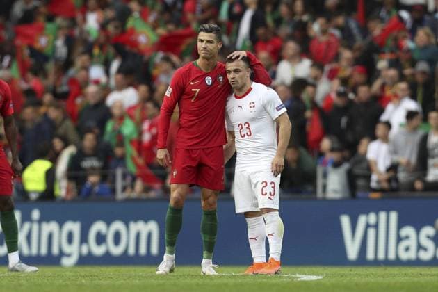 June 5, 2019 - Porto, Porto, Portugal - Cristiano Ronaldo forward of Portugal (L) celebrates after scoring a goal with Xherdan Shaqiri midfielder of Switzerland (R) during the UEFA Nations League Semi-finals match between Portugal and Switzerland at the Dragao stadium in Porto on June 5, 2019. Portugal v Switzerland - UEFA Nations League Semi-Final  - ZUMAn230 20190605_zaa_n230_620 Copyright: xDpix