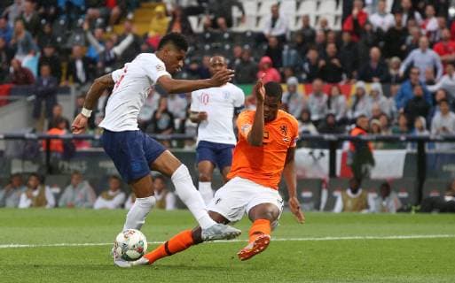 Netherlands v England UEFA Nations League Semi-Final Denzel Dumfries of Netherlands tackles Marcus Rashford of England in the penalty area during the UEFA Nations League Semi-Final match at Estadio D. Afonso Henrique, Guimaraes Content Not Available For UK Newspapers Copyright: xPaulxChestertonx FIL-13327-0033