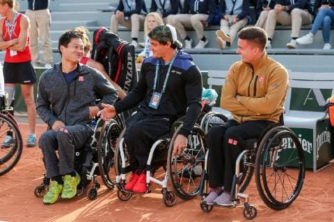 Shingo Kunieda of Japan, Gustavo Fernandez of Argentina and Gordon Reid of Great Britain during the trophy ceremony of the French Open wheelchair and quad wheelchair tennis tournament at the Roland Garros in Paris, France on June 8, 2019.  (105399010)