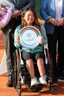 Yui Kamiji of Japan poses with the trophy during the trophy ceremony of the French Open wheelchair and quad wheelchair tennis tournament at the Roland Garros in Paris, France on June 8, 2019.  (105399011)