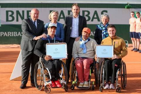 Gustavo Fernandez of Argentina and Gordon Reid of Great Britain pose with the trophies during the trophy ceremony of the French Open wheelchair and quad wheelchair tennis tournament at the Roland Garros in Paris, France on June 8, 2019.  (105399012)