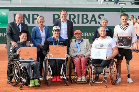 (L-R) Shingo Kunieda of Japan, Gustavo Fernandez of Argentina, Nicolas Peifer and Stephane Houdet of France pose with the trophies during the trophy ceremony of the French Open wheelchair and quad wheelchair tennis tournament at the Roland Garros in Paris, France on June 8, 2019.  (105399029)