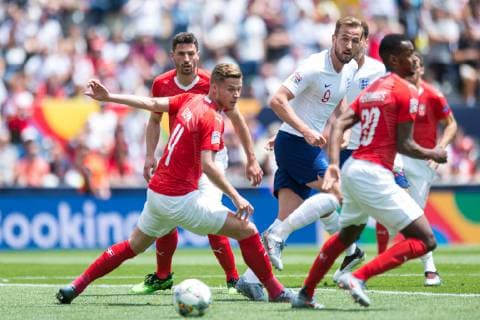 Guimaraes, Portugal, 09 06 2019, UEFA Nations League, 3 Place, Switzerland England, Nico Elvedi Switzerland , Harry Kane England and Edimilson Fernandes Switzerland battle for the ball Defodi 09 531 002170 Defodi-531