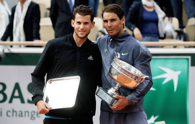 TENNIS - ATP, Tennis Herren French Open 2019 PARIS,FRANCE,09.JUN.19 - TENNIS - ATP World Tour, French Open, Roland Garros, Grand Slam, final. Image shows Dominic Thiem (AUT) and Rafael Nadal (ESP). Keywords: award, trophy. GEPAxpictures xMatthiasxHauer