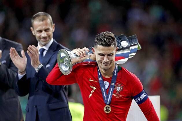PORTO, 09-06-2019, Estadio Dragao , UEFA Nations League Final between Portugal and The Netherlands. Portugal player Christiano Ronaldo (R) with the cup after the game Portugal - Netherlands (1-0). Portugal - Netherlands  x3636710x Copyright:
