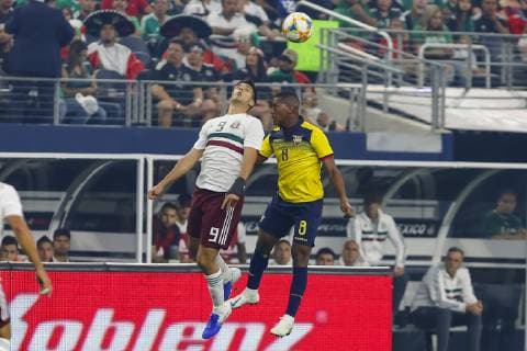 ARLINGTON, TX - JUNE 09: Mexico forward Raul Jimenez (9) and Ecuador midfielder Carlos Gruezo (8) goes up for a header during the game on June 09, 2019 at AT&T Stadium in Arlington, Texas. (Photo by Matthew Pearce Icon Sportswire) SOCCER: JUN 09 Mexico v Ecuador Icon1691906092489