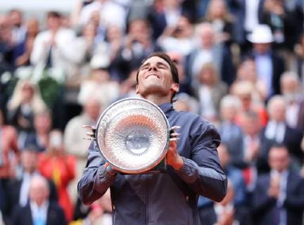 (190610) -- PARIS, June 10, 2019 (Xinhua) -- Rafael Nadal of Spain holds the trophy during the awarding ceremony after the men s singles final against Dominic Thiem of Austria at French Open tennis tournament 2019 at Roland Garros, in Paris, France on June 9, 2019. Nadal won 3-1 to claim the title. (Xinhua Gao Jing) (SP)FRANCE-PARIS-TENNIS-ROLAND GARROS-MEN S SINGLES-FINAL 