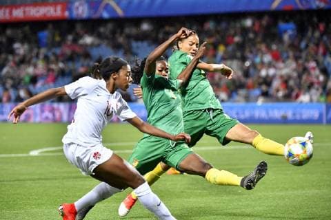 (190611) -- MONTPELLIER, June 11, 2019 (Xinhua) -- Yvonne Leuko (C) and Estelle Johnson (R) of Cameroon defend Ashley Lawrence of Canada during the group E match between Canada and Cameroon at the 2019 FIFA Women s World Cup in Montpellier, France on June 10, 2019. Canada won 1-0. (Xinhua Chen Yichen) (SP)FRANCE-MONTPELLIER-2019 FIFA WOMEN S WORLD CUP-GROUP E-CANADA VS CAMEROON 