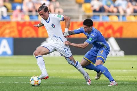 June 11, 2019 - Gdynia, pomorskie, Poland - Luca Pellegrini of Italy and Denys Popov of Ukraine are seen in action during the FIFA U-20 World Cup match between Ukraine and Italy (semi-finals) in Gdynia. Ukraine Vs Italy in Gdynia, Poland - 11 Jun 2019 - ZUMAs197 20190611_zaa_s197_049 Copyright: xTomaszxZasinskix