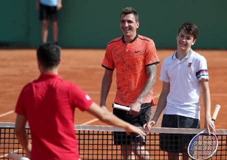 (190613) -- ZAGREB, June 13, 2019 -- Mario Mandzukic (C) plays tennis during Gem Set Croatia, a humanitarian sports event organized by the Marin Cilic Foundation, in Zagreb, Croatia, June 12, 2019. ) (SP)CROATIA-ZAGREB-HUMANITARIAN SPORTS EVENT-GEM SET CROATIA IgorxKralj 