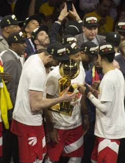 June 13, 2019 - Oakland, California, USA - Marc Gasol 33 of the Toronto Raptors celebrates with the Larry O Brien Championship Trophy after his team defeated the Golden State Warriors to win Game Six of the 2019 NBA, Basketball Herren, USA Finals at ORACLE Arena on June 13, 2019 in Oakland, California.. Toronto Raptors Win 2019 NBA Championship - ZUMAa60_ 20190613_zaf_a60_043 Copyright: xArmandoxArorizox