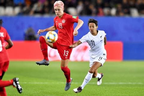 (190616) -- GRENOBLE, June 16, 2019 (Xinhua) -- Sophie Schmidt (L) of Canada vies with Sarah Gregorius (R) of New Zealand during the group E match between Canada and New Zealand at the 2019 FIFA Women s World Cup in Grenoble, France on June 15, 2019. Canada won 2-0. (Xinhua Chen Yichen) (SP)FRANCE-GRENOBLE-2019 FIFA WOMEN S WORLD CUP-GROUP E-CANADA VS NEW ZEALAND 