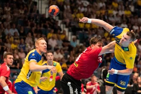 190616 Daniel Dicker of Austria and Markus Olsson of Sweden during the EHF EURO CUP match between Sweden and Austria on June 16, 2019 in Stockholm,  Copyright: ANDREASxLxERIKSSON BB190616AE007