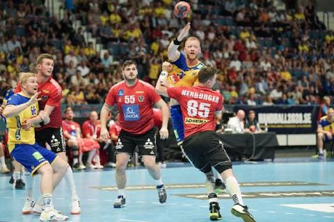 Sweden s Jim Gottfridsson top R is challenged by Austria s Tobias Wagner 55 and Lukas Herburger 85 during the EHF Euro Cup handball match between Sweden and Austria at Hovet arena in Stockholm, Sweden, on June 16, 2019 STOCKHOLM SWEDEN HANDBALL x10070x,  Copyright: xJessicaxGow TTx HANDBALL EURO CUP SWEDEN-AUSTRIA