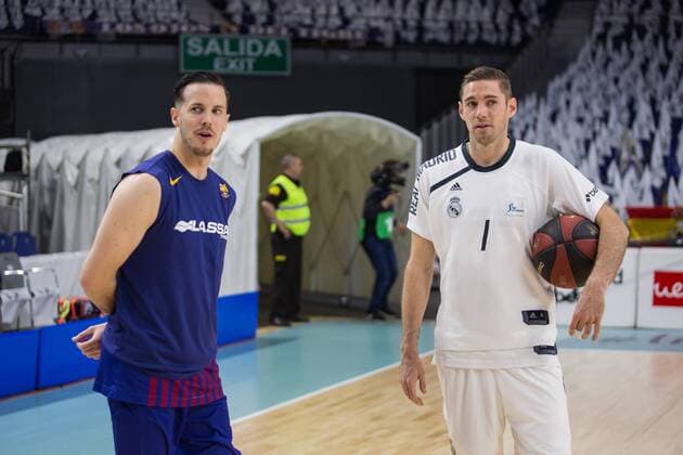 Spain: Real Madrid vs FC Barcelona, Barca Lassa Thomas Heurtel (L) and Fabien Causeur (R) during Real Madrid victory over FC Barcelona Lassa (87 - 67) in Liga Endesa finals playoff series (game 1) celebrated in Madrid (Spain) at Wizink Center. June 16th 2019. Madrid Madrid Spain WiZink Center  JuanxCarlosxGarcíaxMatex xPacificxPress