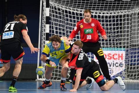 Johannes GOLLA GER action, duel against Luigi QUNI KOS li Erik SCHMIDT GER mens handball international, EHF Euro qualification Germany GER Kosovo KOS , on 16 06 2019 Arena Nuernberger Versicherung