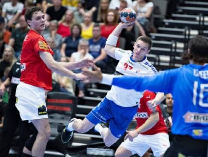 The Faeroe Islands Hans Eli Sigurbjörnsson against Denmarks Niclas Kirkeloekke in the European Championship qualifying championship in mens handball between Denmark and the Faeroese in Jutlander Bank Arena Aalborg, Sunday, June 16, 2019, Aalborg Jutland Denmark,  Copyright: HenningxBagger HenningxBaggerx COP101 spdk20190616-195540-L