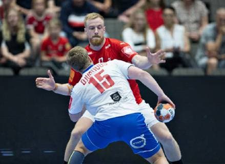 Denmarks Rene Antonsen against the Faeroe Islands Jonas Gunnarsson Djurhuus in the European Championship qualifying championship in mens handball between Denmark and the Faeroese in Jutlander Bank Arena Aalborg, Sunday, June 16, 2019, Aalborg Jutland Denmark,  Copyright: HenningxBagger HenningxBaggerx COP101 spdk20190616-200613-L
