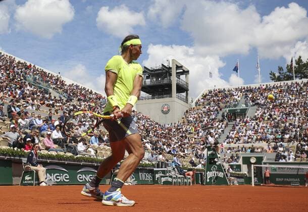 Rafael Nadal plays a backhand on the court Suzanne Lenglen, from behind, frogs perspective Copyright: xJuergenxHasenkopfx