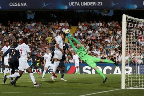Paul Bernardoni of France saves the ball as Dominic Solanke of England goes close during the UEFA Under-21 Championship 2019 match at Dino Manuzzi, Cesena. Picture date: 18th June 2019. Picture credit should read: Jonathan Moscrop Sportimage EDITORIAL USE ONLY. No use with unauthorised audio, video, data, fixture lists, club league logos or live services. Online in-match use limited to 120 images, no video emulation. No use in betting, games or single club league player publications. SPI-0101-0012
