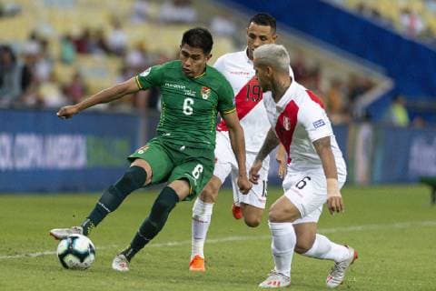Bolivia vs. Peru RIO DE JANEIRO, RJ - 18.06.2019: BOLIVIA VS. PERU - Saavedra Flores (Zagueiro) and Miguel Trauco (Zagueiro) during a match between Bolivia and Peru, valid for the group stage of the Copa America 2019, held this Tuesday (Maracanã Stadium) in Rio de Janeiro, RJ. (Photo: Celso Pupo Fotoarena) x1749685x  CelsoxPupo