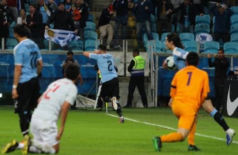 20th June 2019, Arena do Gremio, Porto Alegre, Brazil. Copa America international football, Uruguay versus Japan; Jose Gimenez of Uruguay celebrates scoring his headed goal to equalise at 2-2  ActionPlus12146019 MaxxPeixoto