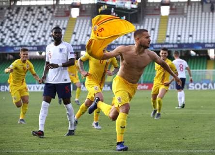 Sport Bilder des Tages George Puscas of Romania celebrates scoring the first goal from the penalty spot during the UEFA Under-21 Championship 2019 match at San Marino Stadium, Serravalle. Picture date: 21st June 2019. Picture credit should read: Jonathan Moscrop Sportimage EDITORIAL USE ONLY. No use with unauthorised audio, video, data, fixture lists, club league logos or live services. Online in-match use limited to 120 images, no video emulation. No use in betting, games or single club league player publications. SPI-0103-0019