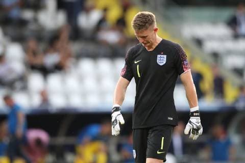 Dean Henderson of England reacts dejectedly during the UEFA Under-21 Championship 2019 match at San Marino Stadium, Serravalle. Picture date: 21st June 2019. Picture credit should read: Jonathan Moscrop Sportimage EDITORIAL USE ONLY. No use with unauthorised audio, video, data, fixture lists, club league logos or live services. Online in-match use limited to 120 images, no video emulation. No use in betting, games or single club league player publications. SPI-0103-0066