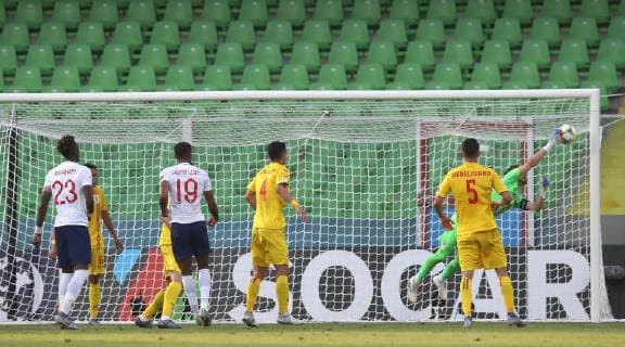 Demari Gray of England clips the shot into the top corner past a diving Ionut Radu of Romania during the UEFA Under-21 Championship 2019 match at Stadio Dino Manuzzi, Cesena. Picture date: 21st June 2019. Picture credit should read: Jonathan Moscrop Sportimage EDITORIAL USE ONLY. No use with unauthorised audio, video, data, fixture lists, club league logos or live services. Online in-match use limited to 120 images, no video emulation. No use in betting, games or single club league player publications. SPI-0103-0024