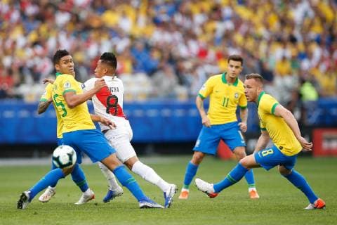 Peru vs. Brazil SÃO PAULO, SP - 22.06.2019: PERU VS. BRAZIL - Cueva of Peru contests ball with Casemiro of Brazil during match between Peru and Brazil, valid for the last round group phase of Copa América 2019, held this Saturday (22) at the Corinthians Arena in São Paulo, SP. (Photo: Marcelo Machado de Melo Fotoarena) x1751231x  MarceloxMachadoxdexMelo