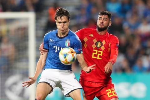 Italian Federico Chiesa and Belgium s Elias Cobbaut fight for the ball during a soccer game between Belgium s national U21, U 21 team and Italy s U21 team, Saturday 22 June 2019, match 3 3 in group A at the 2019 European championships Under 21 in Reggio, Italy. BRUNOxFAHY  x05611141x