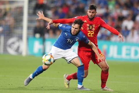 Italian Federico Chiesa and Belgium s Elias Cobbaut fight for the ball during a soccer game between Belgium s national U21, U 21 team and Italy s U21 team, Saturday 22 June 2019, match 3 3 in group A at the 2019 European championships Under 21 in Reggio, Italy. BRUNOxFAHY  x05611139x