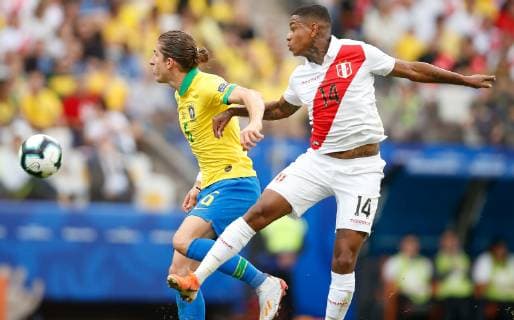 Peru vs. Brazil SÃO PAULO, SP - 22.06.2019: PERU VS. BRAZIL - Filipe Luis do Brasil fights with Andy Jorman Polo Andrade of Peru during a match between Peru and Brazil, valid for the last round group stage of the Copa América 2019, held this Saturday (22) at the Corinthians Arena in São Paulo, SP. (Photo: Marcelo Machado de Melo Fotoarena) x1751264x  MarceloxMachadoxdexMelo