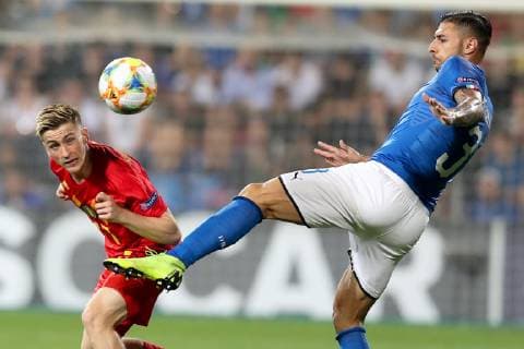 Belgium s Alexis Saelemaekers and Italian Guiseppe Pezzella fight for the ball during a soccer game between Belgium s national U21, U 21 team and Italy s U21 team, Saturday 22 June 2019, match 3 3 in group A at the 2019 European championships Under 21 in Reggio, Italy. BRUNOxFAHY  x05611166x
