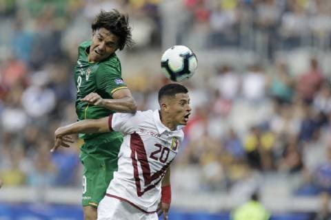 (190623) -- BELO HORIZONTE, June 23, 2019 -- Marcelo Moreno of Bolivia (L) vies with Hernandez Pimentel of Venezuela during the Copa America 2019 soccer match between Venezuela and Bolivia at Mineirao Stadium in Belo Horizonte, Brazil, June 22, 2019. ) (lt) (SP)BRAZIL-BELO HORIZONTE-COPA AMERICA 2019-VENEZUELA VS BOLIVIA LucioxTavora 