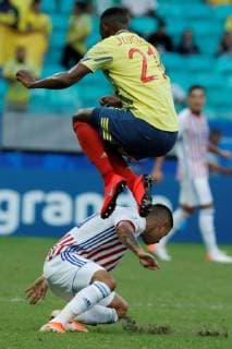 Colombia s Lucumi (up) vies for the ball with Paraguay s Derlis Gonzalez during the Copa America 2019 Group B soccer match between Colombia and Paraguay, at Arena Fonte Nova Stadium in Salvador, Brazil, 23 June 2019. Colombia vs. Paraguay !ACHTUNG: NUR REDAKTIONELLE NUTZUNG!  Copyright: xMauricioxDuenasxCastanedax SCA1665 20190623-636969228469580395