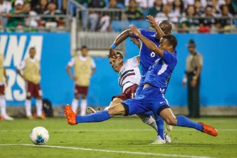 June 23, 2019: Mexico defender Fernando Navarro (19) gets past Martinique defenders to score the third goal of the CONCACAF Gold Cup soccer match between Martinique and Mexico held at Bank of America Stadium in Charlotte, NC. CSM 2019 CONCACAF Gold Cup: Martinique vs Mexico JUN 23 - ZUMAc04_ 20190623_zaf_c04_169 Copyright: xJonathanxHuffx
