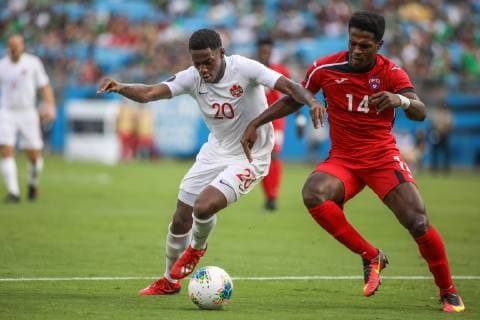 June 23, 2019: Canada forward Jonathan David (20) and Cuba midfielder Jean Carlos Rodriguez (14) battle for the ball during the CONCACAF Gold Cup soccer match between Canada and Cuba held at Bank of America Stadium in Charlotte, NC. CSM 2019 CONCACAF Gold Cup: Canada vs Cuba JUN 23 - ZUMAc04_ 20190623_zaf_c04_173 Copyright: xJonathanxHuffx