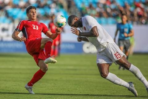 June 23, 2019: Canada defender Doneil Henry (15) heads the ball away before Cuba midfielder Luis Paradela (23) can get to it during the CONCACAF Gold Cup soccer match between Canada and Cuba held at Bank of America Stadium in Charlotte, NC. CSM 2019 CONCACAF Gold Cup: Canada vs Cuba JUN 23 - ZUMAc04_ 20190623_zaf_c04_178 Copyright: xJonathanxHuffx