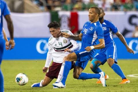 June 23, 2019: Mexico defender Edson Alvarez (4) gets run into by Martinique defender Yann Thimon (14) in the 2019 Gold Cup match at Bank of America Stadium in Charlotte, NC. ( ) 2019 CONCACAF Gold Cup: Martinique vs Mexico JUN 23 - ZUMAc04_ 20190623_zaf_c04_193 Copyright: xScottxKinserx