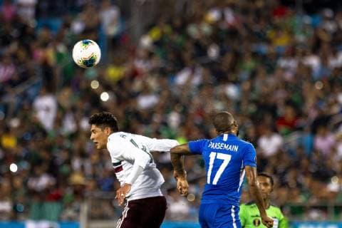 June 23, 2019: Mexico defender Fernando Navarro (19) goes for a header against Martinique forward Etages Kevin Parsemain (17) in the 2019 Gold Cup match at Bank of America Stadium in Charlotte, NC. ( ) 2019 CONCACAF Gold Cup: Martinique vs Mexico JUN 23 - ZUMAc04_ 20190623_zaf_c04_202 Copyright: xScottxKinserx