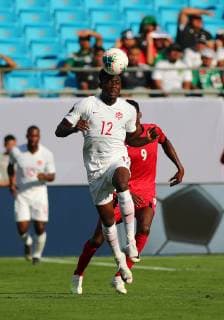 CHARLOTTE, NC - JUNE 23: Canada midfielder Alphonso Davies (12) hits the ball with his head during the 1st half of the CONCACAF Gold Cup game with Canada versus Cuba on June 23rd, 2019, at Bank of America Stadium in Charlotte, NC. (Photo by Jaylynn Nash Icon Sportswire) SOCCER: JUN 23 CONCACAF Gold Cup Group A - Canada v Cuba Icon19062300029