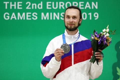 MINSK, BELARUS â€“ JUNE 24, 2019: Russia s Sergei Kamensky poses with his silver medal at a victory ceremony for a men s 10m air rifle event at the Minsk 2019 Europaspiele Sergei Bobylev TASS  TS0B0B70