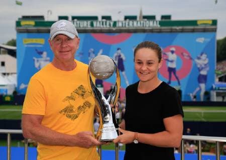 24th June 2019, Devonshire Park, Eastbourne, England; Nature Valley International Tennis Tournament; Ashleigh Barty (AUS) with her coach and her WTA, Tennis Damen World Singles No 1 Trophy that she won at the weekend  ActionPlus12147581 HongboxChen