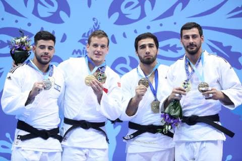 MINSK, BELARUS - JUNE 24, 2019: Athletes Li Kochman of Israel, Mikail Ozerler of Turkey, Khasan Khalmurzayev of Russia, and Mammadali Mekhdiyev (L-R) of Azerbaijan pose with their medals at a victory ceremony after their men s middleweight (-90kg) judo event at the 2nd Europaspiele Natalia Fedosenko TASS  TS0B0C38