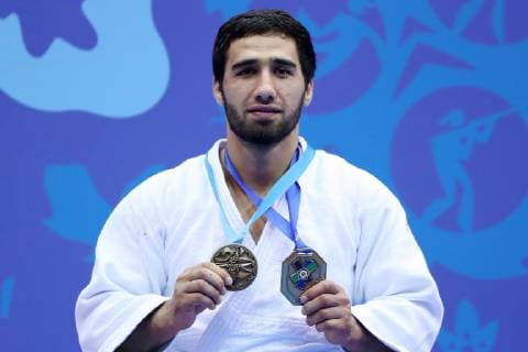 MINSK, BELARUS - JUNE 24, 2019: Athlete Khasan Khalmurzayev of Russia poses with his bronze medal at a victory ceremony after their men s middleweight (-90kg) judo event at the 2nd Europaspiele Natalia Fedosenko TASS  TS0B0C3B